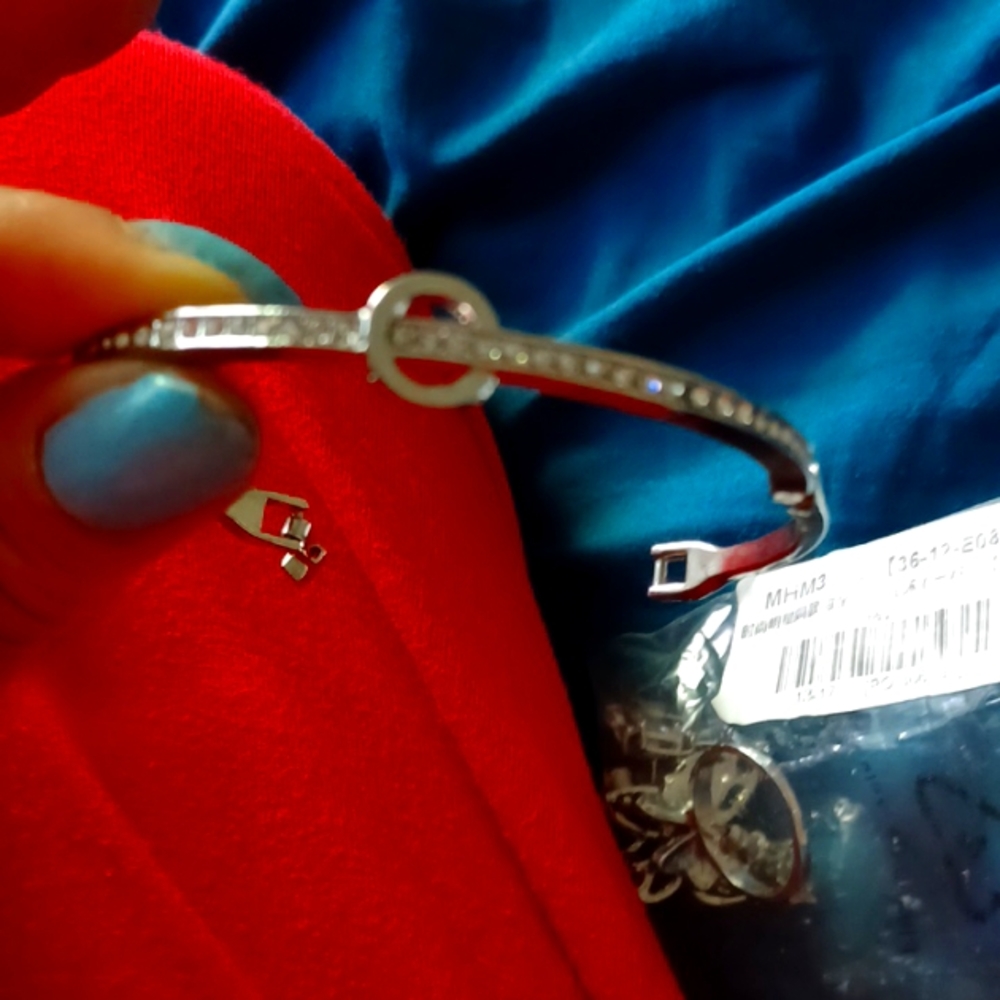 Sterling silver bangle is beautiful size 7 to 8 inches.